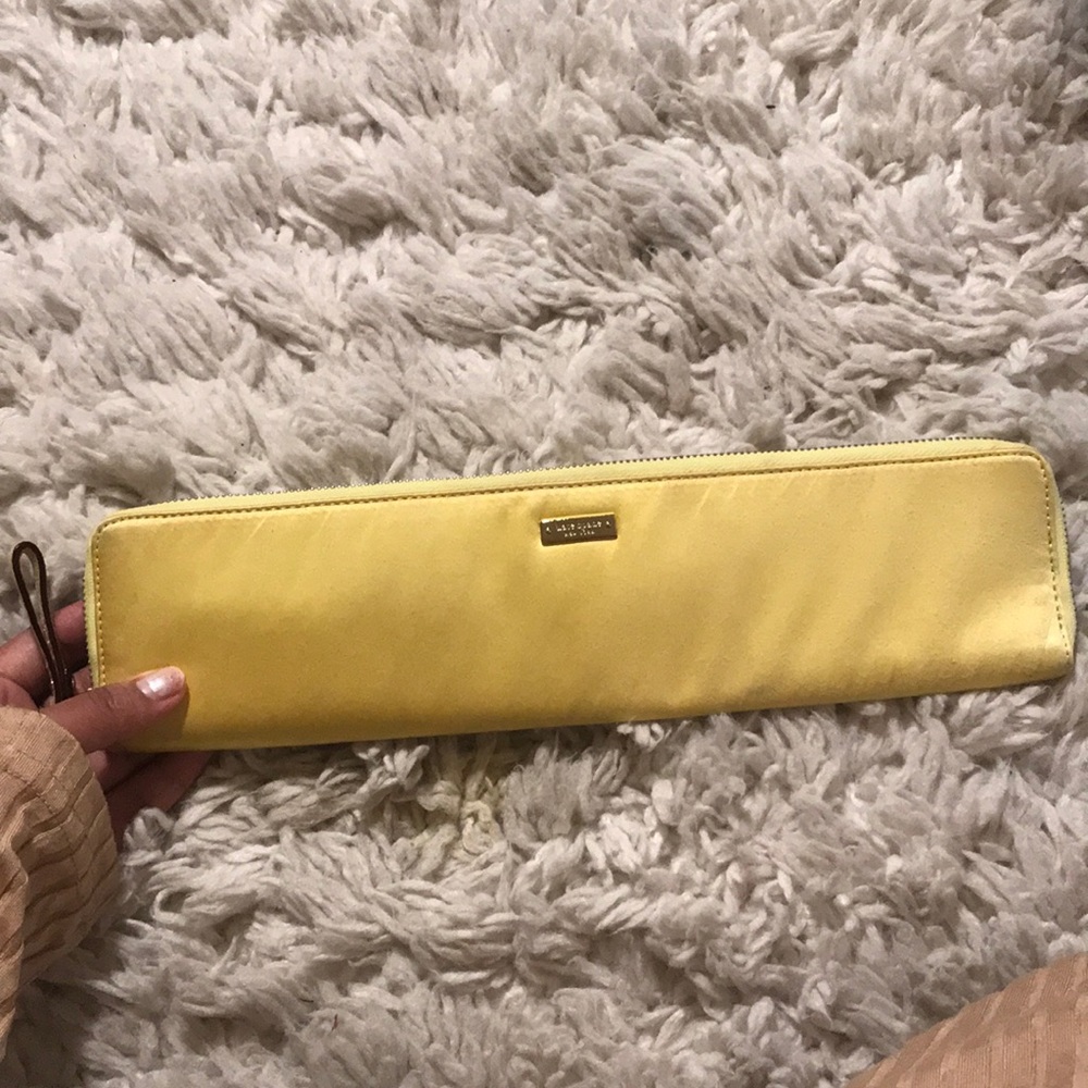Canary yellow Kate Spade longline clutch